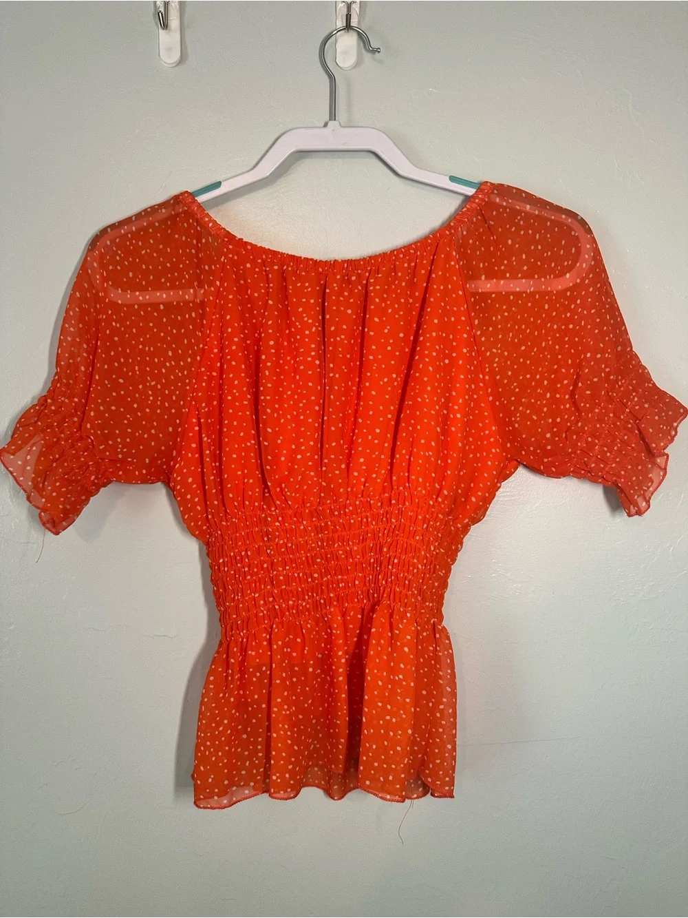 Orange Dot Peplum Smocked Blouse